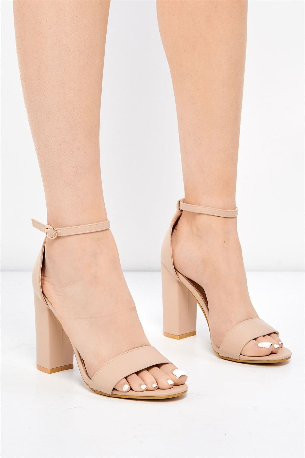 May Barely There Block Heel Ankle Strap Sandal in Nude PU